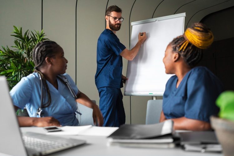 side-view-nurses-studying-together